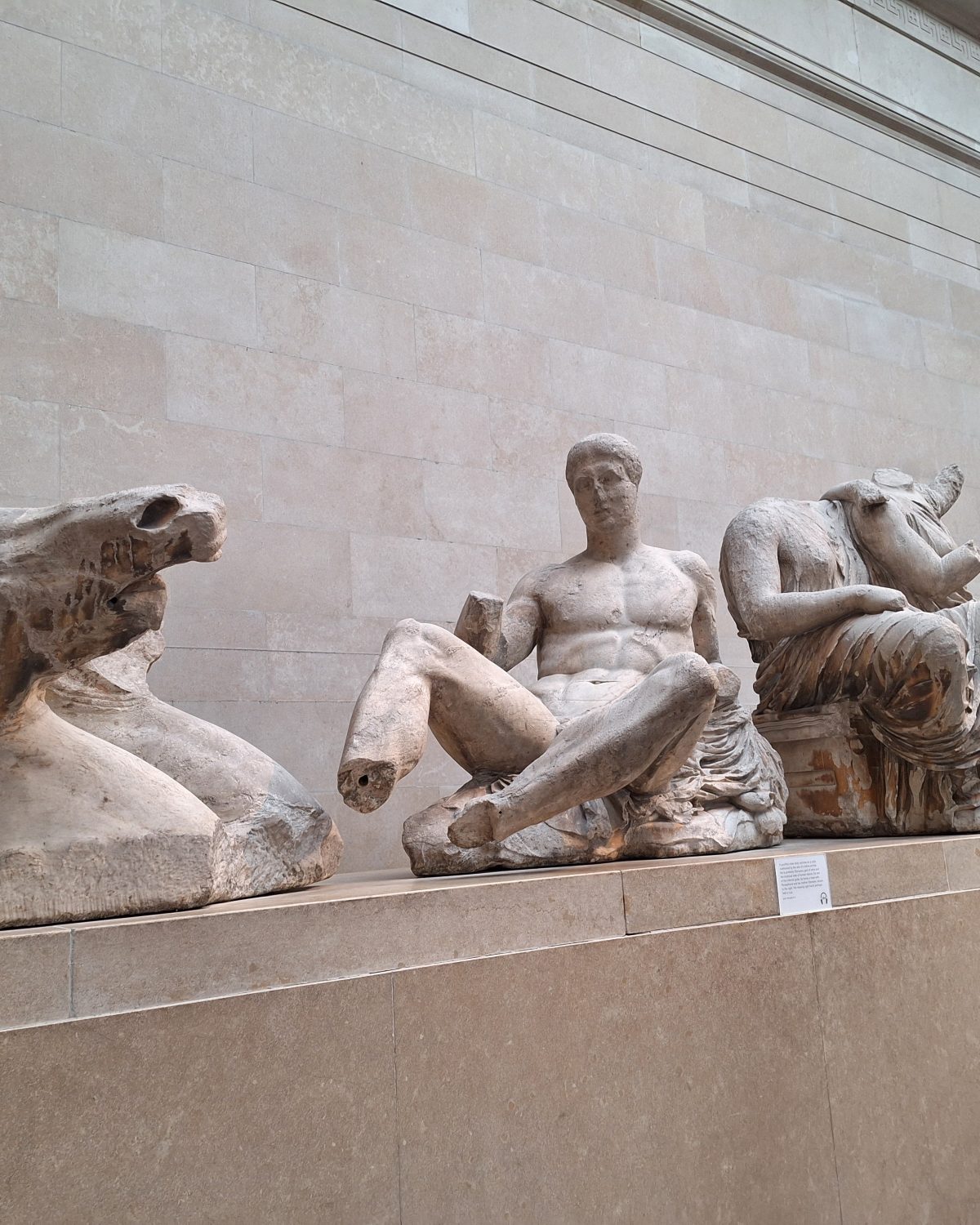 Damaged marble sculptures from the Parthenon collection with missing limbs
